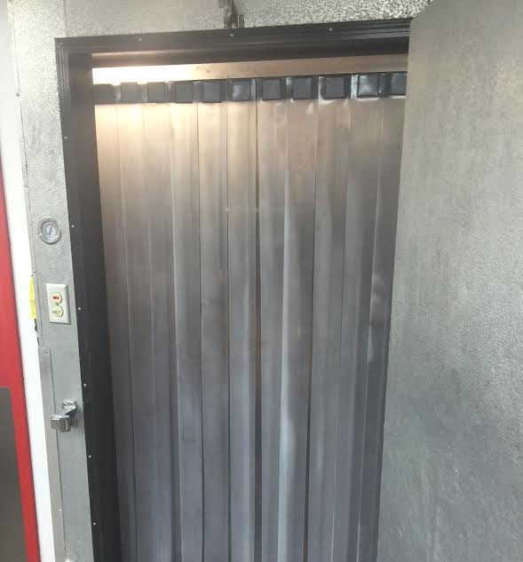 A door with a metal strip on it